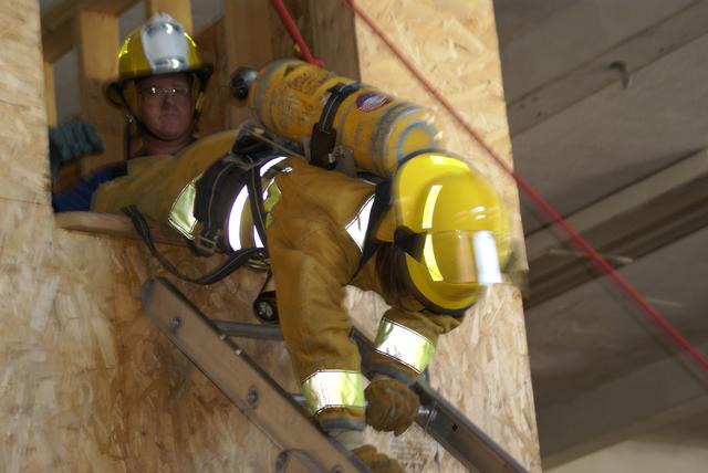 Christina Barbour exits 2nd story window head first. Ladder bail technique during New York State Firefighter Survival course in Willsboro NY 9/25/2010